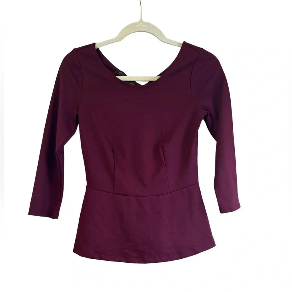 THE LIMITED EGGPLANT PEPLUM TOP